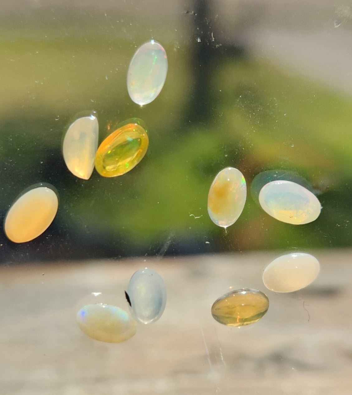 Natural Ethiopian Fire Opal Lot – 10 Faceted Cabochon Gems (Approx. 1.5 Carats Total) | Flashy Play-of-Color, Jewelry & Collector Quality!