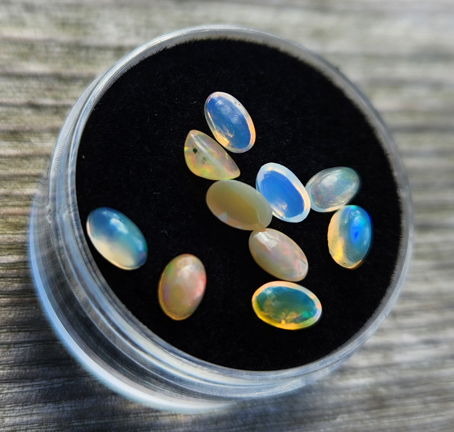 Natural Ethiopian Fire Opal Lot – 10 Faceted Cabochon Gems (Approx. 1.5 Carats Total) | Flashy Play-of-Color, Jewelry & Collector Quality
