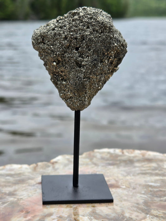 Pyrite cluster on stand front view