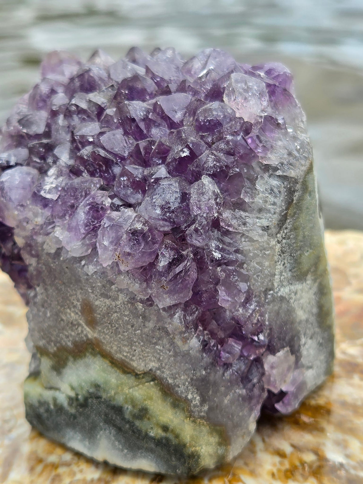 Purple amethyst cluster front view