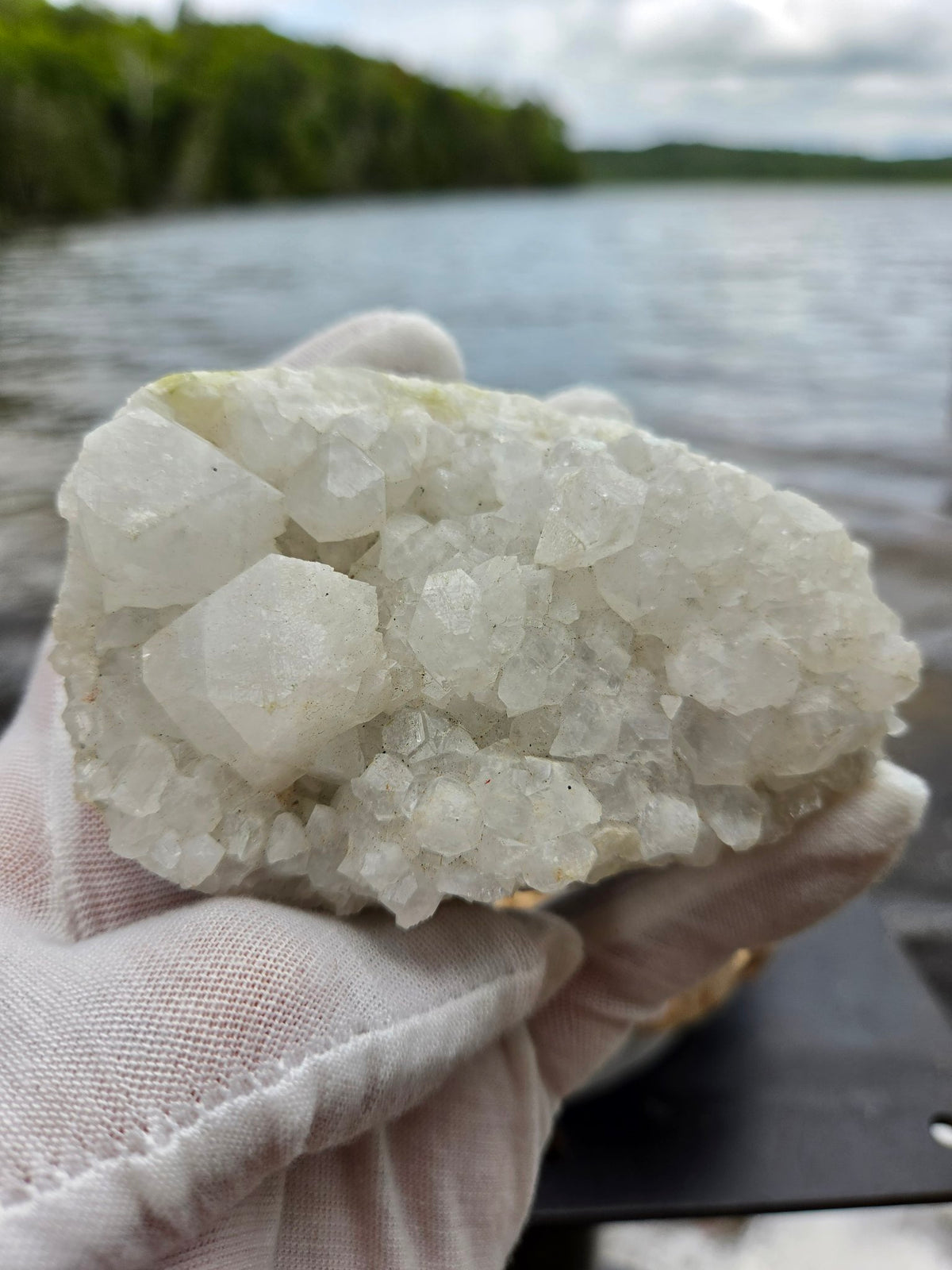 Apophyllite stilbite cluster held in hand