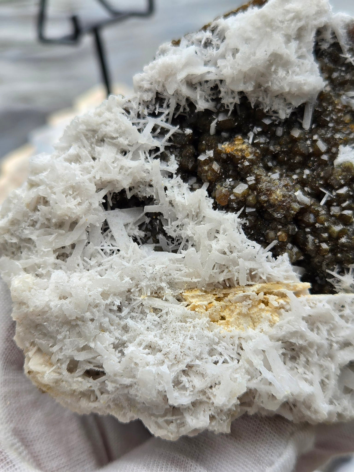 Dark garnet crystals with white scolecite sprays