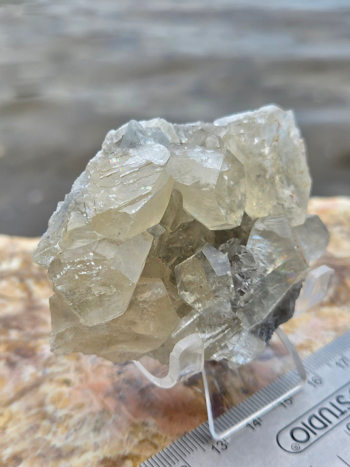 Honey calcite on matrix back view
