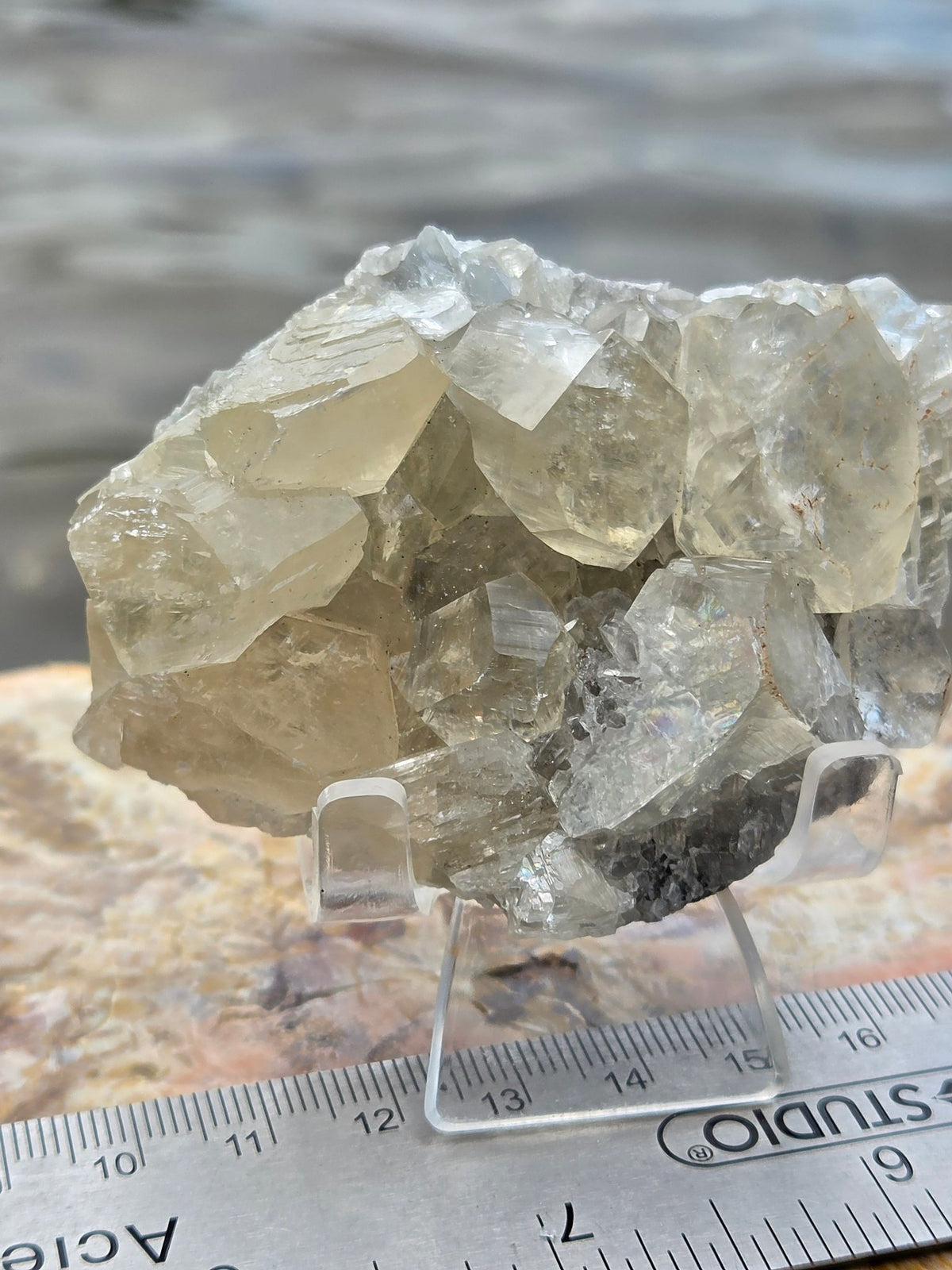 Honey calcite with rainbow iridescence