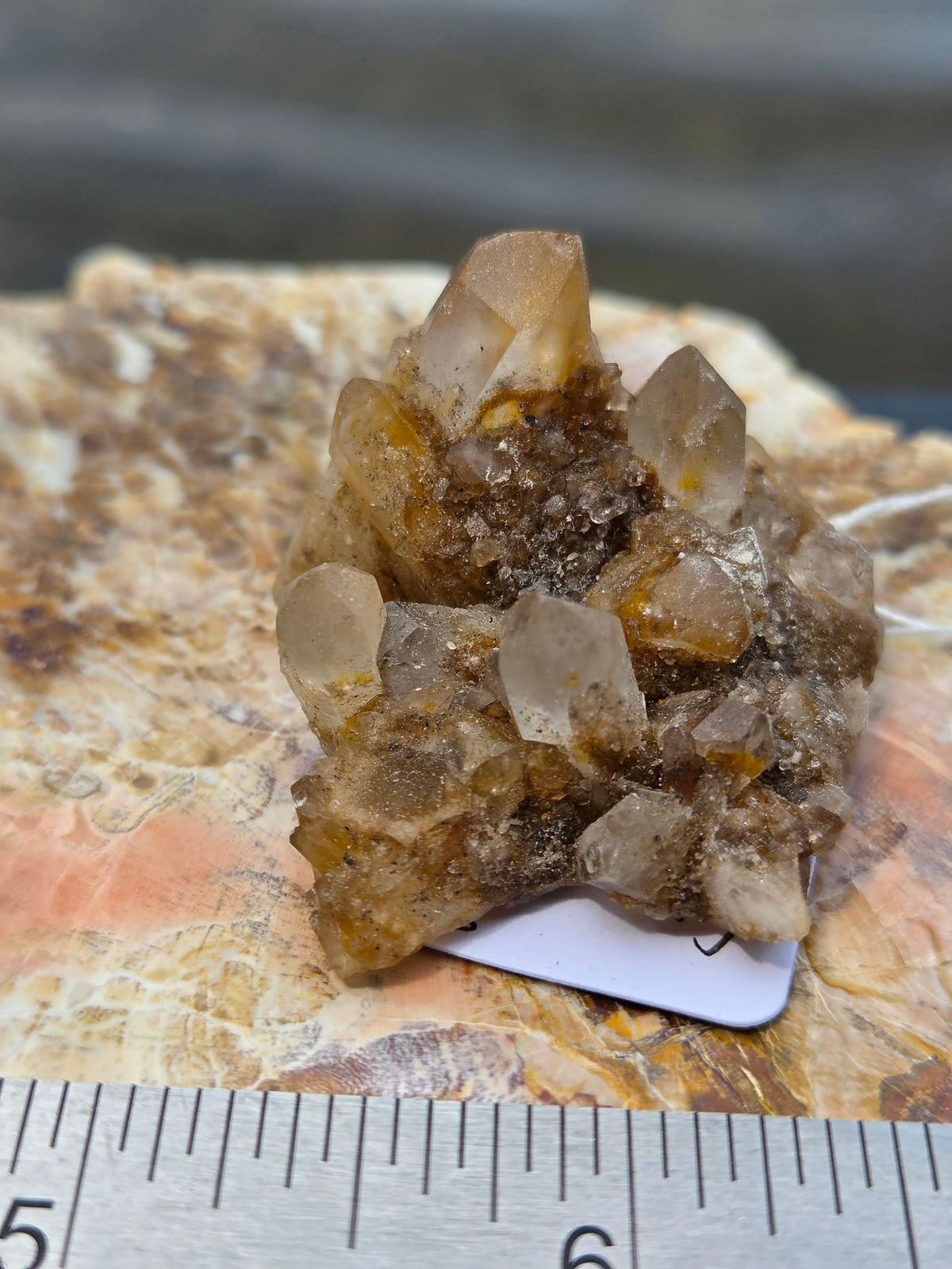 Pineapple quartz cluster with hematite and iron inclusions, front view