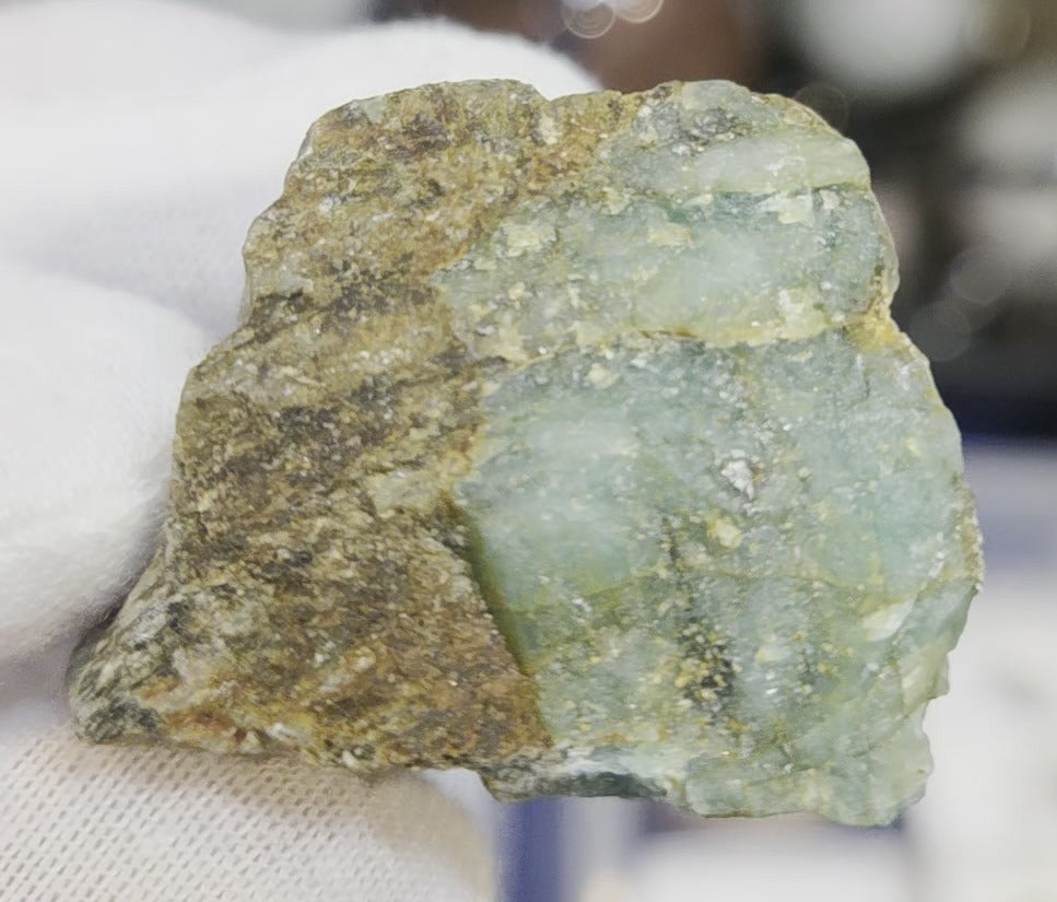 Raw green emerald on matrix specimen