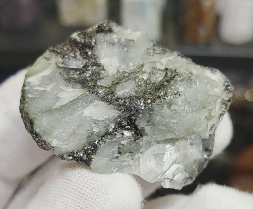 Raw green emerald on matrix specimen