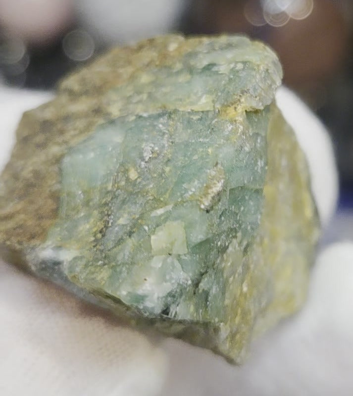 Raw green emerald on matrix specimen