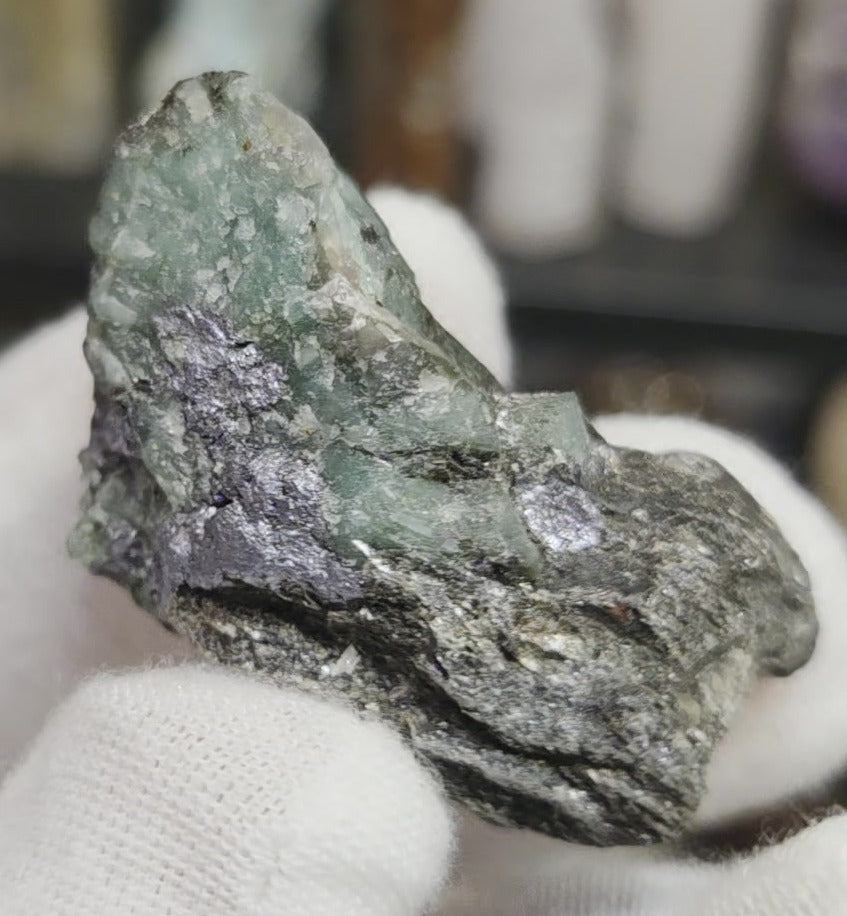 Raw green emerald on matrix specimen