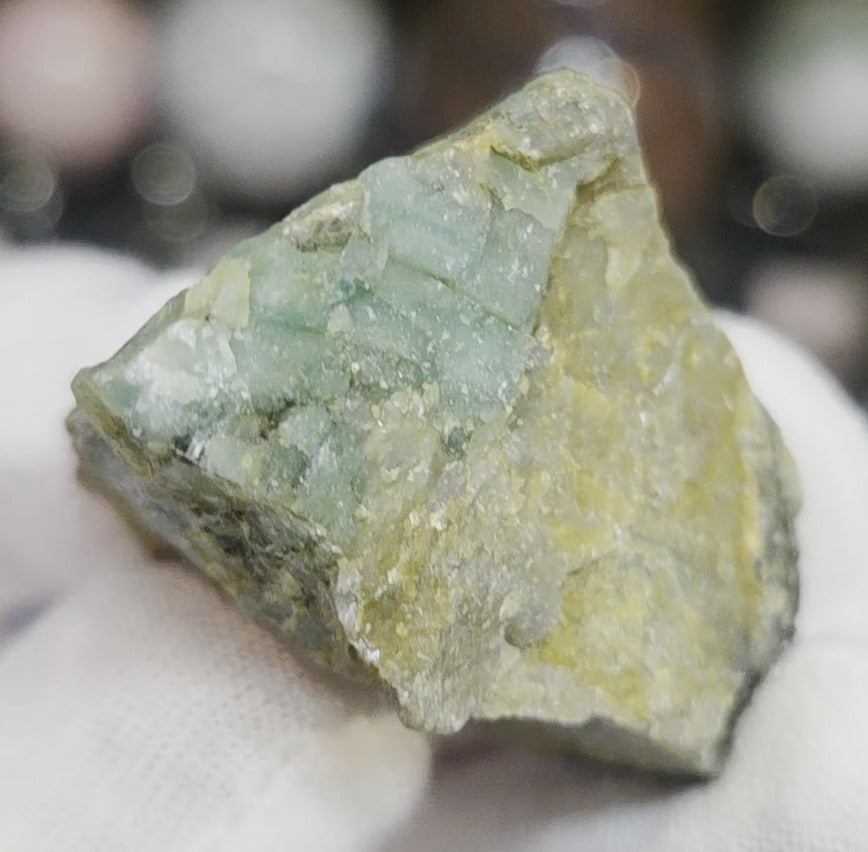 Raw green emerald on matrix specimen