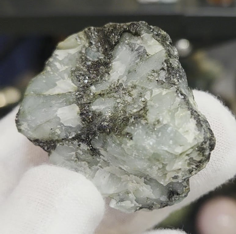 Raw green emerald on matrix specimen