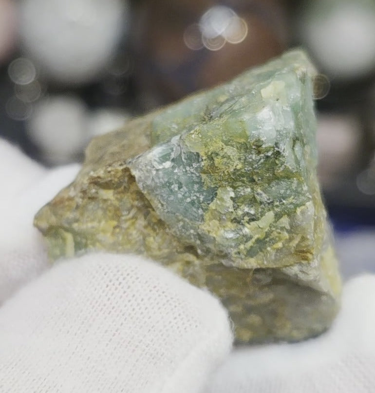 Raw green emerald on matrix specimen