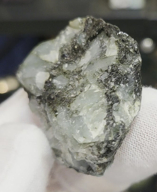 Raw green emerald on matrix specimen