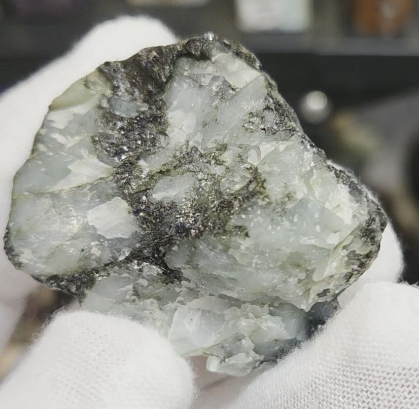 Raw green emerald on matrix specimen