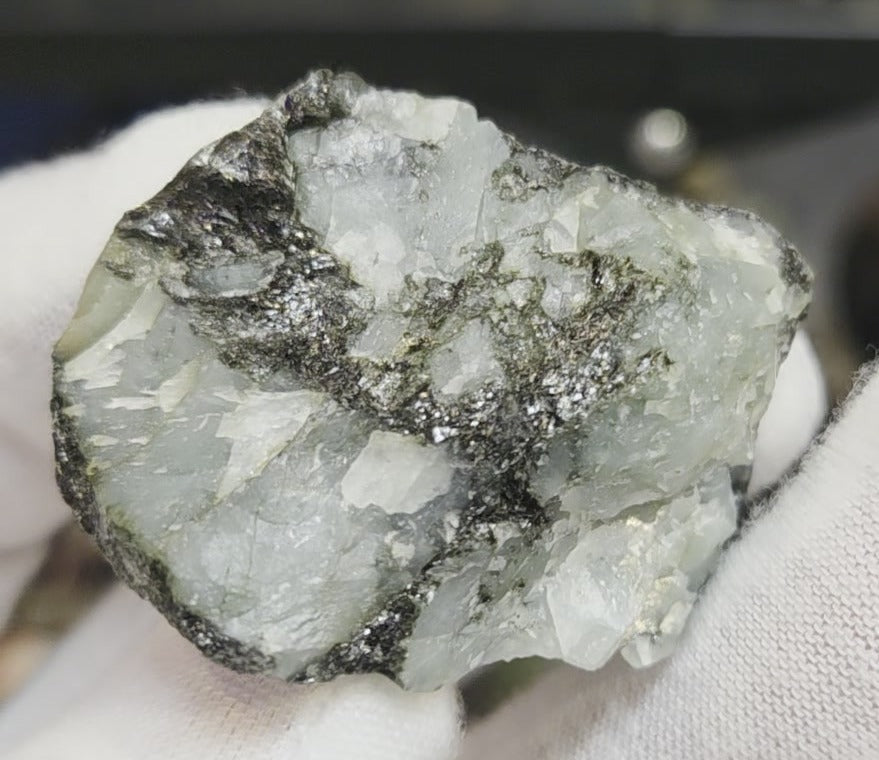 Raw green emerald on matrix specimen
