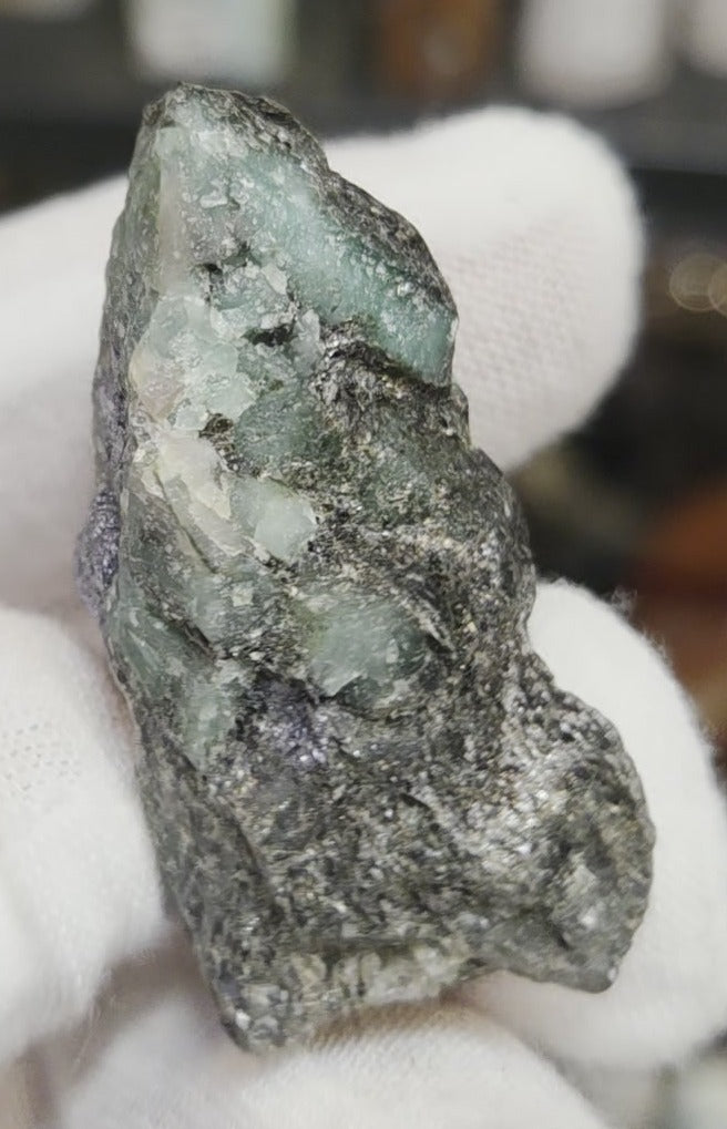 Raw green emerald on matrix specimen