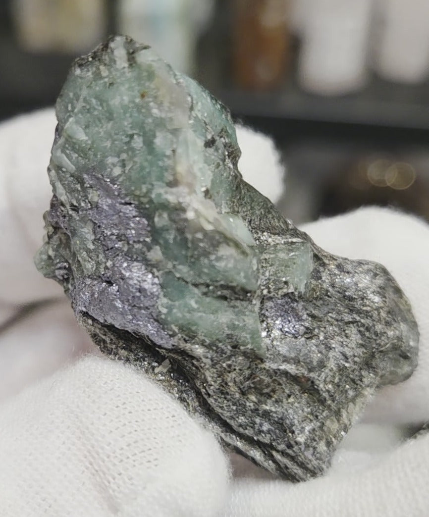 Raw green emerald on matrix specimen