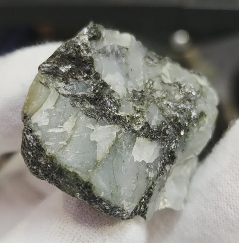 Raw green emerald on matrix specimen