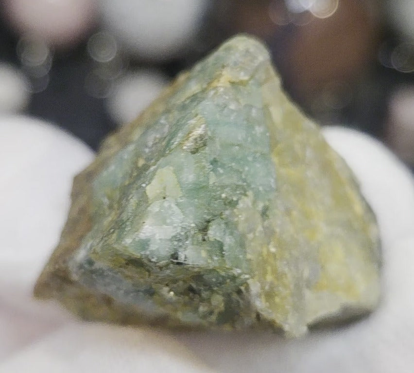 Raw green emerald on matrix specimen