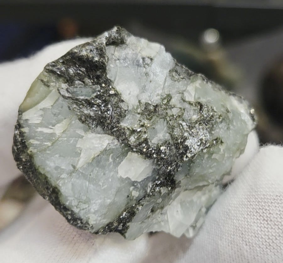 Raw green emerald on matrix specimen