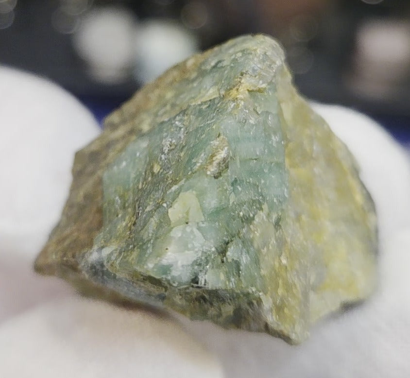 Raw green emerald on matrix specimen