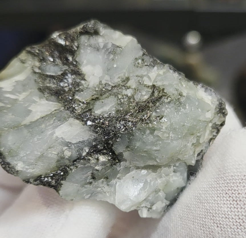 Raw green emerald on matrix specimen