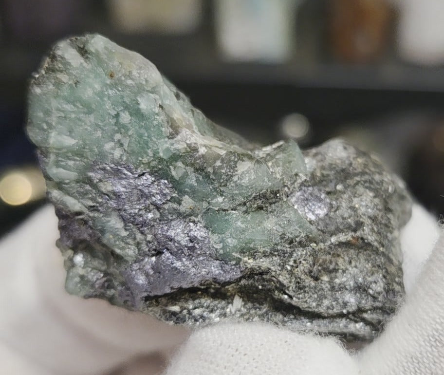 Raw green emerald on matrix specimen