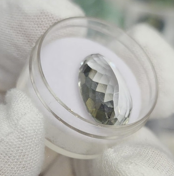 Green amethyst faceted oval gemstone