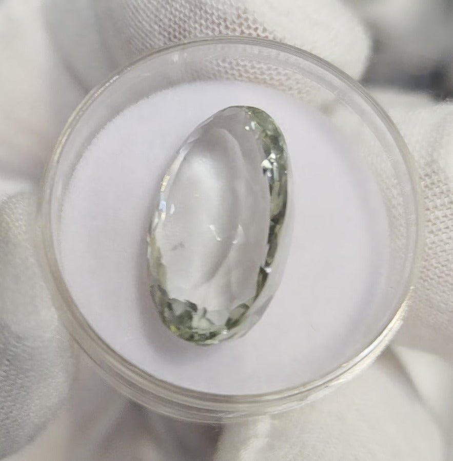 Green amethyst faceted oval gemstone, back side