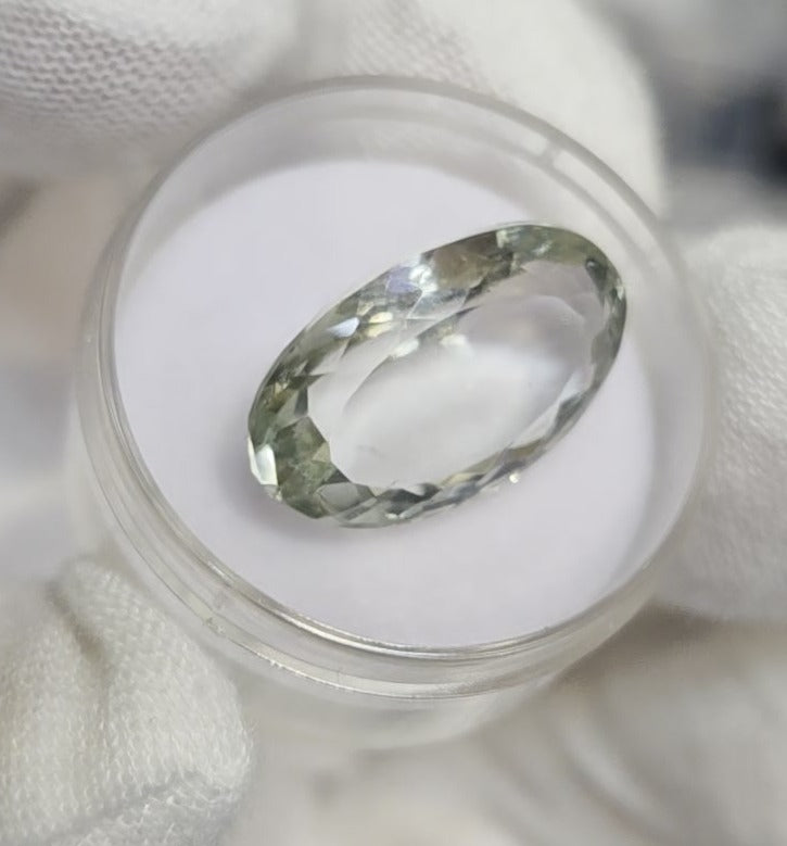 Green amethyst faceted oval gemstone, back side