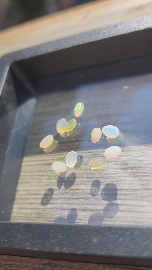 Natural Ethiopian Fire Opal Lot – 10 Faceted Cabochon Gems (Approx. 1.5 Carats Total) | Flashy Play-of-Color, Jewelry & Collector Quality!