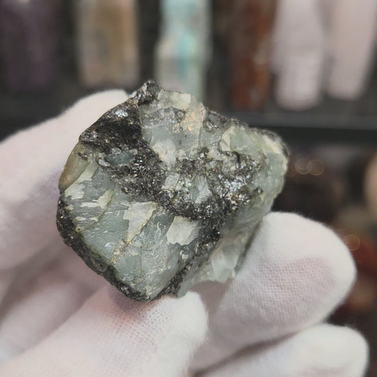 Raw green emerald on matrix specimen