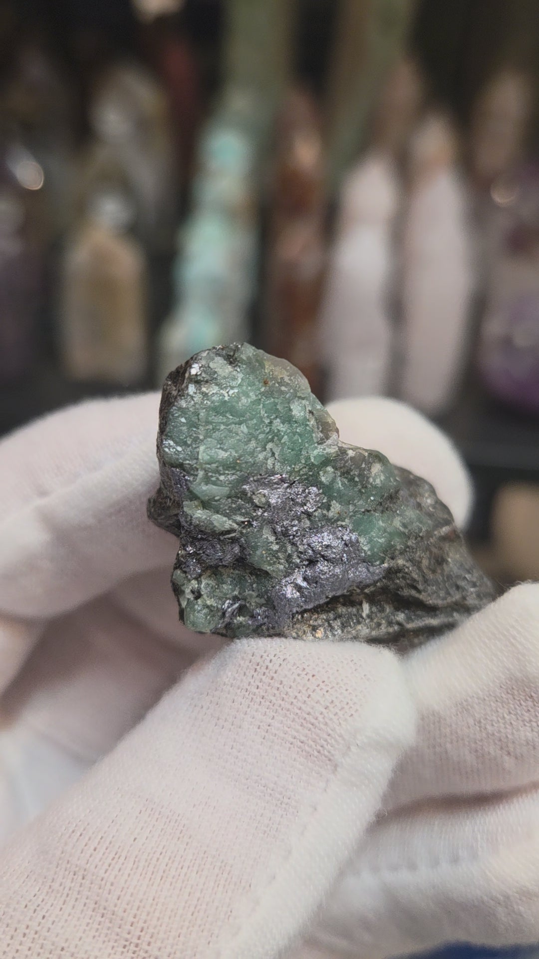 Raw green emerald on matrix specimen