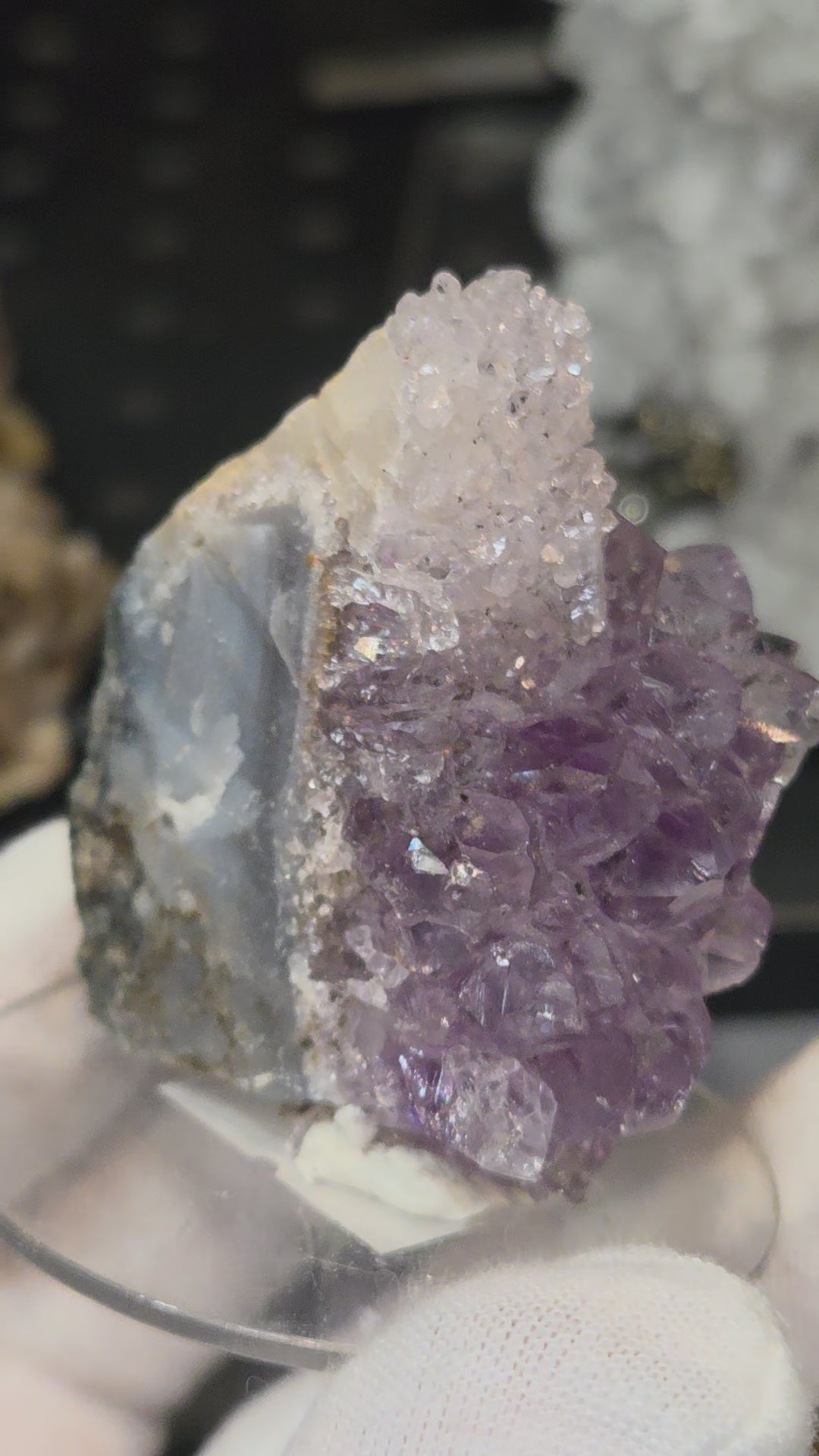 Sugar druzy calcite on amethyst cluster specimen