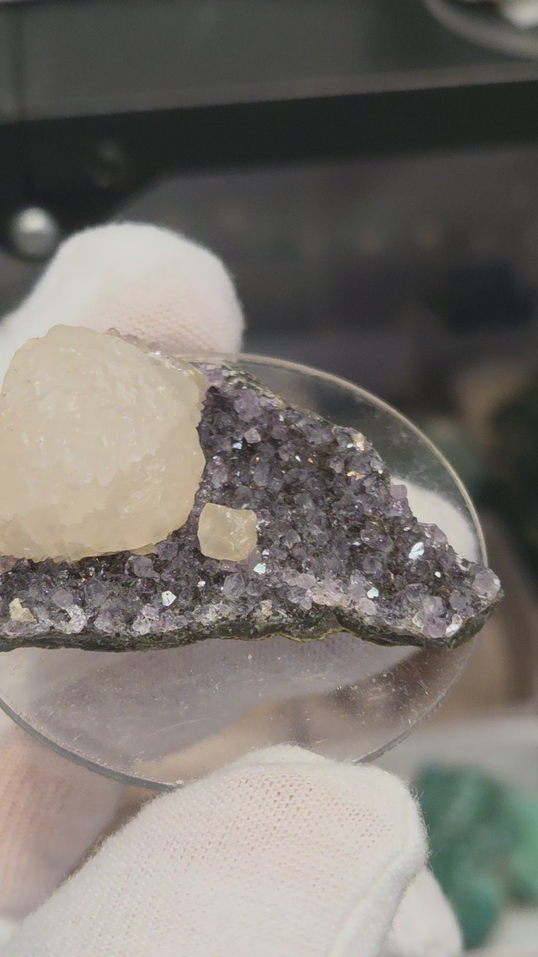 Botryoidal calcite on amethyst cluster specimen