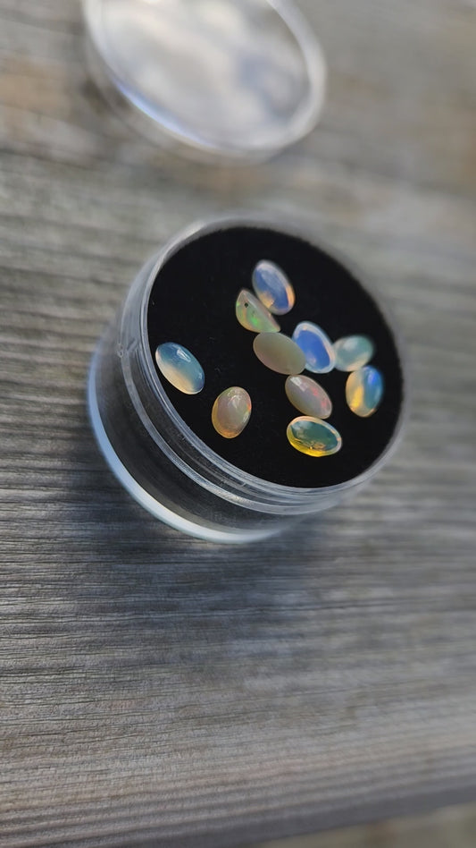 Natural Ethiopian Fire Opal Lot – 10 Faceted Cabochon Gems (Approx. 1.5 Carats Total) | Flashy Play-of-Color, Jewelry & Collector Quality