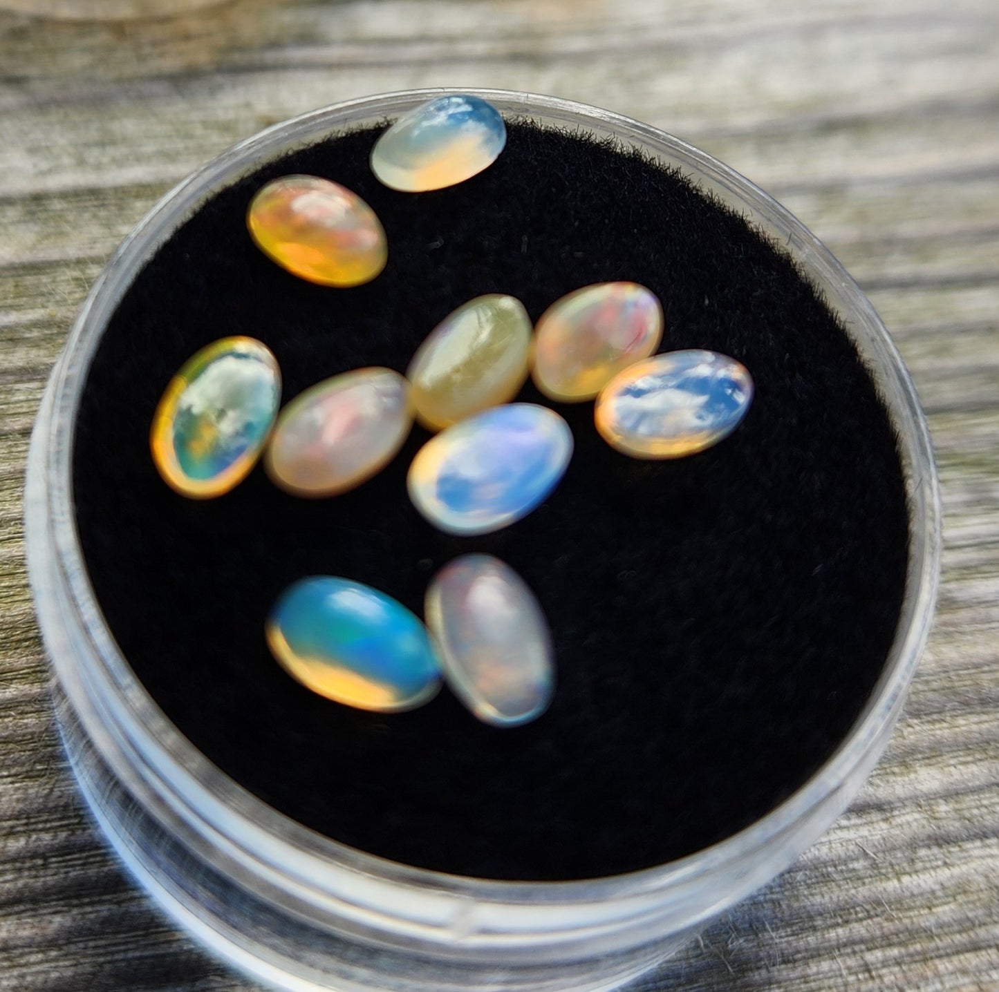 Natural Ethiopian Fire Opal Lot – 10 Faceted Cabochon Gems (Approx. 1.5 Carats Total) | Flashy Play-of-Color, Jewelry & Collector Quality