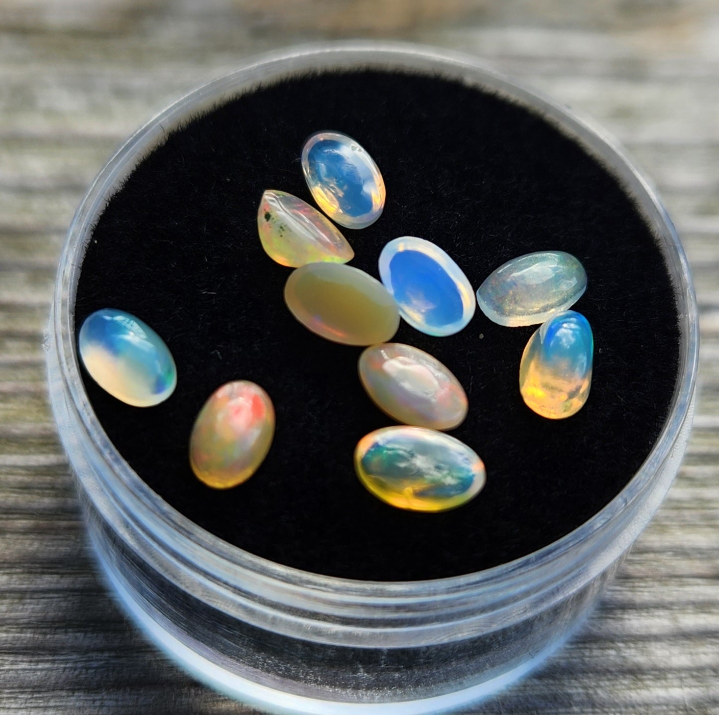 Natural Ethiopian Fire Opal Lot – 10 Faceted Cabochon Gems (Approx. 1.5 Carats Total) | Flashy Play-of-Color, Jewelry & Collector Quality