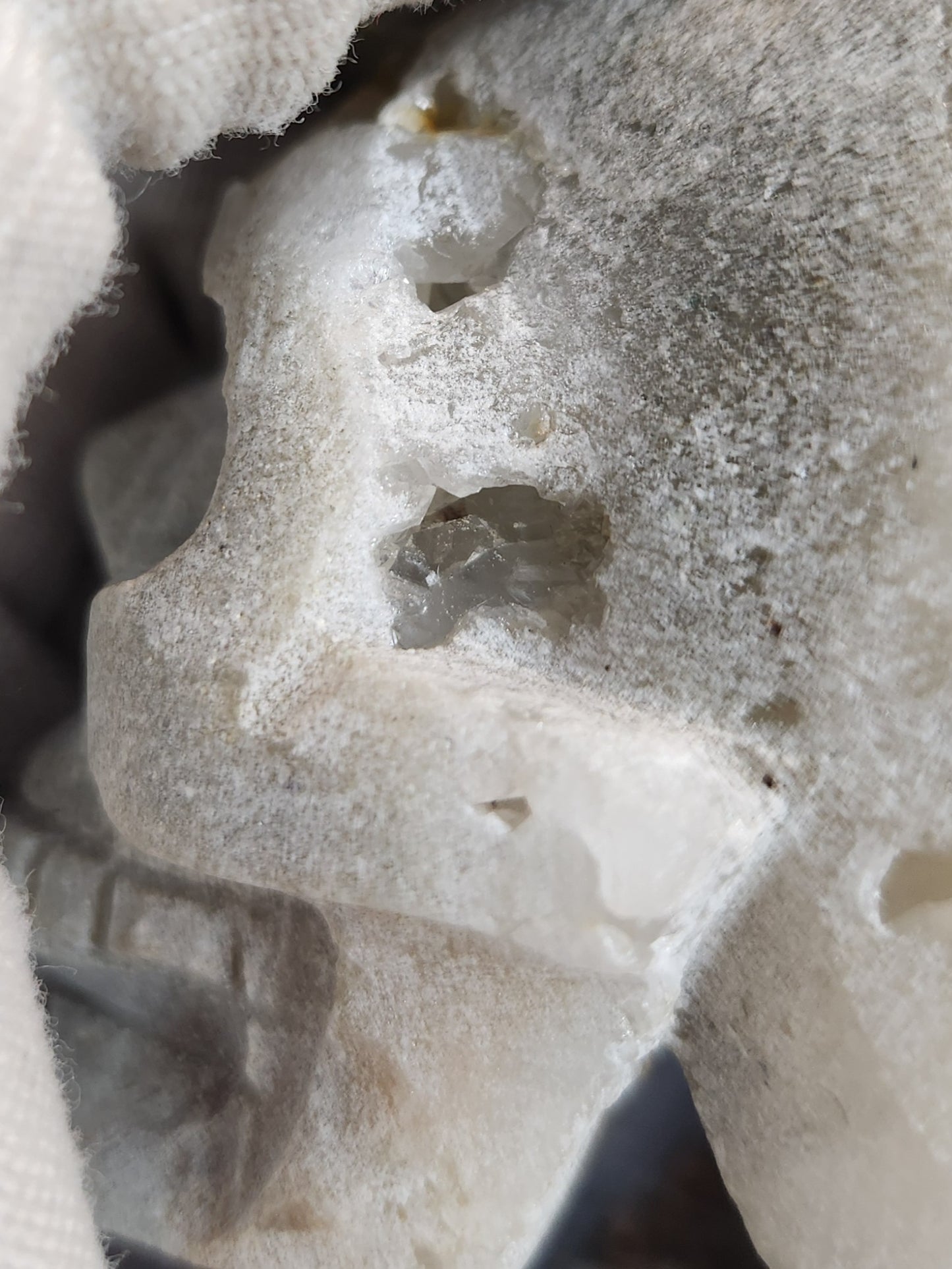 Hand-Carved Quartz Crystal Skull with Natural Druzy Cavities & Large Quartz Formations