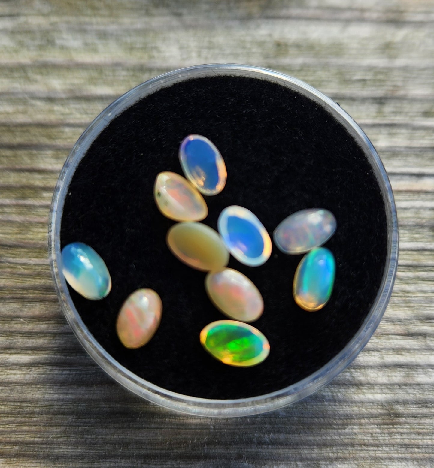 Natural Ethiopian Fire Opal Lot – 10 Faceted Cabochon Gems (Approx. 1.5 Carats Total) | Flashy Play-of-Color, Jewelry & Collector Quality