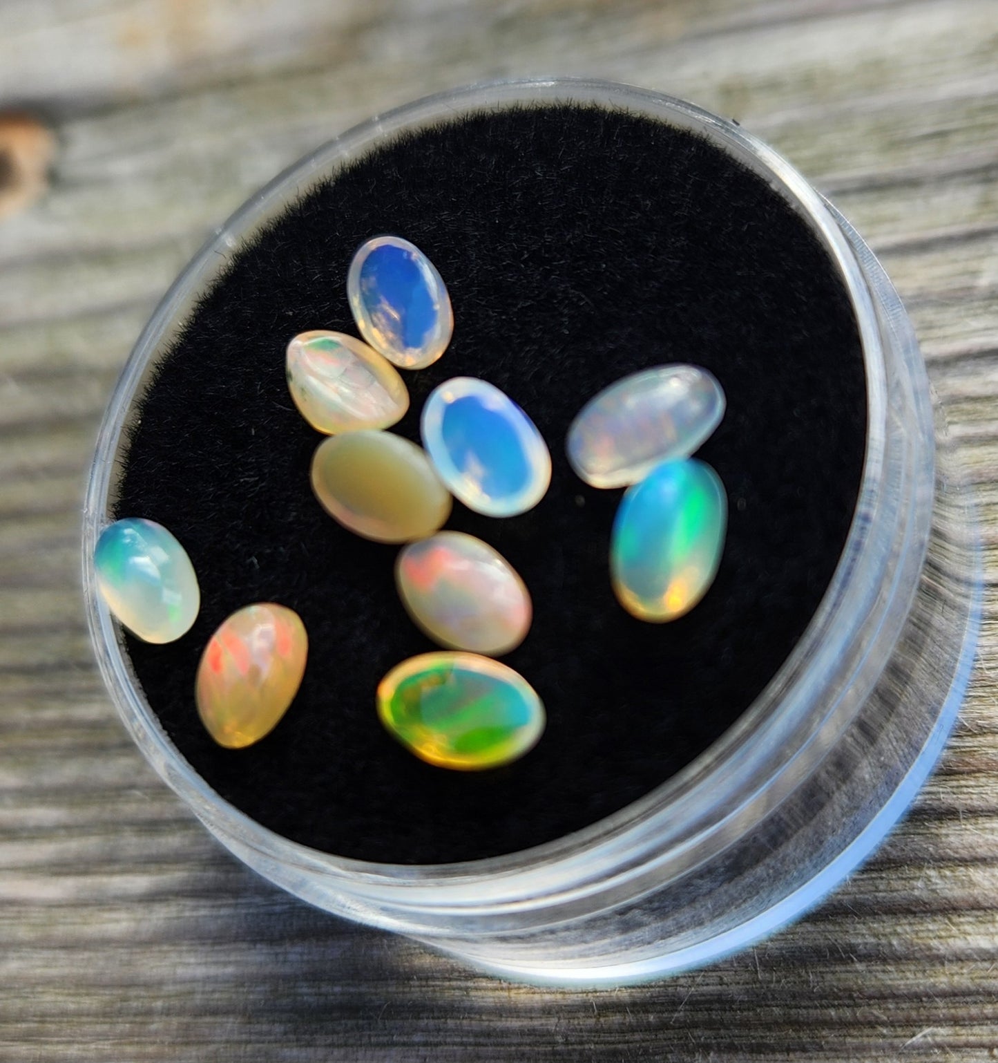 Natural Ethiopian Fire Opal Lot – 10 Faceted Cabochon Gems (Approx. 1.5 Carats Total) | Flashy Play-of-Color, Jewelry & Collector Quality