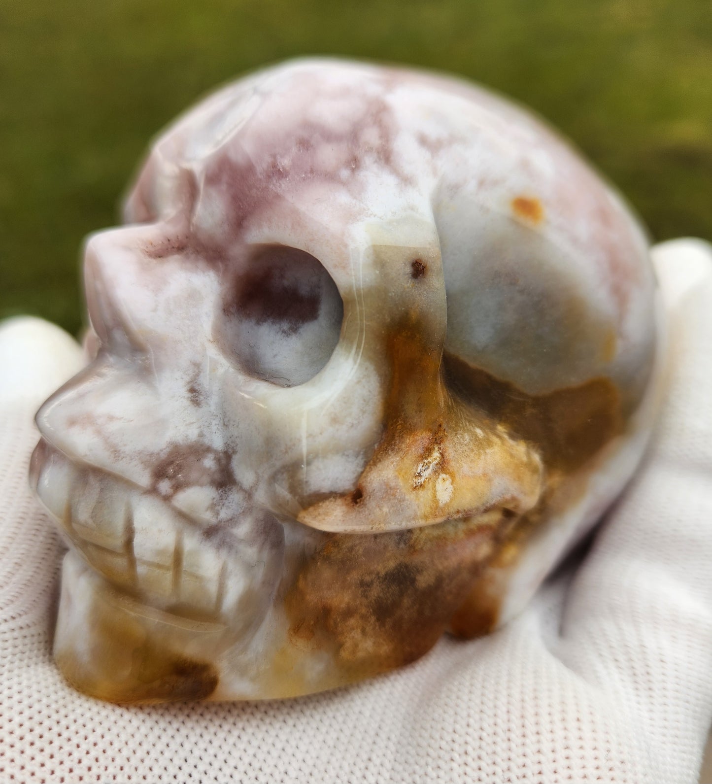 Flower Agate Skull Carving – Pink, White & Golden Orbicular Patterns – Premium Hand-Carved Stone