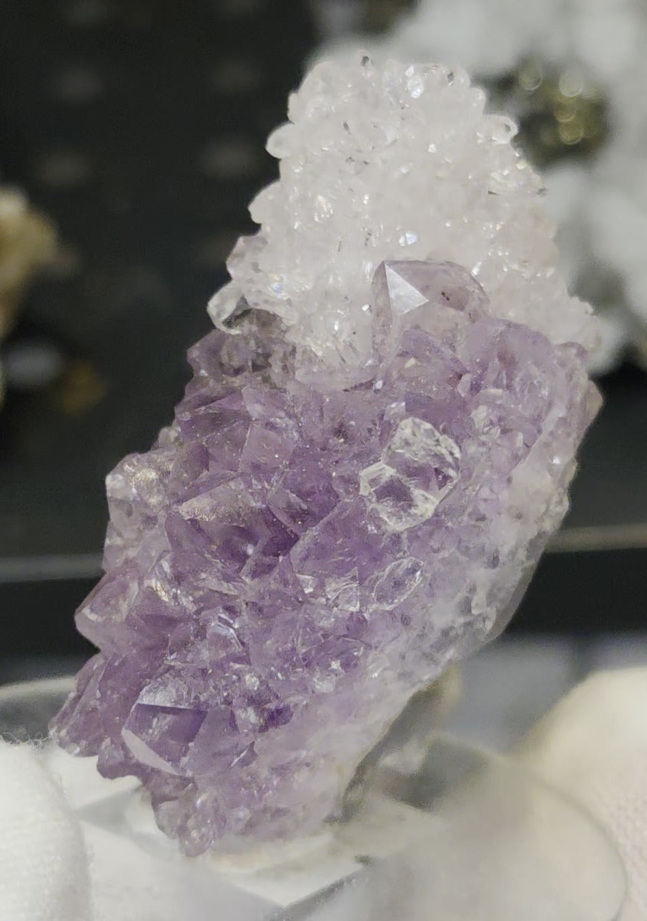 Sugar druzy calcite on amethyst cluster specimen