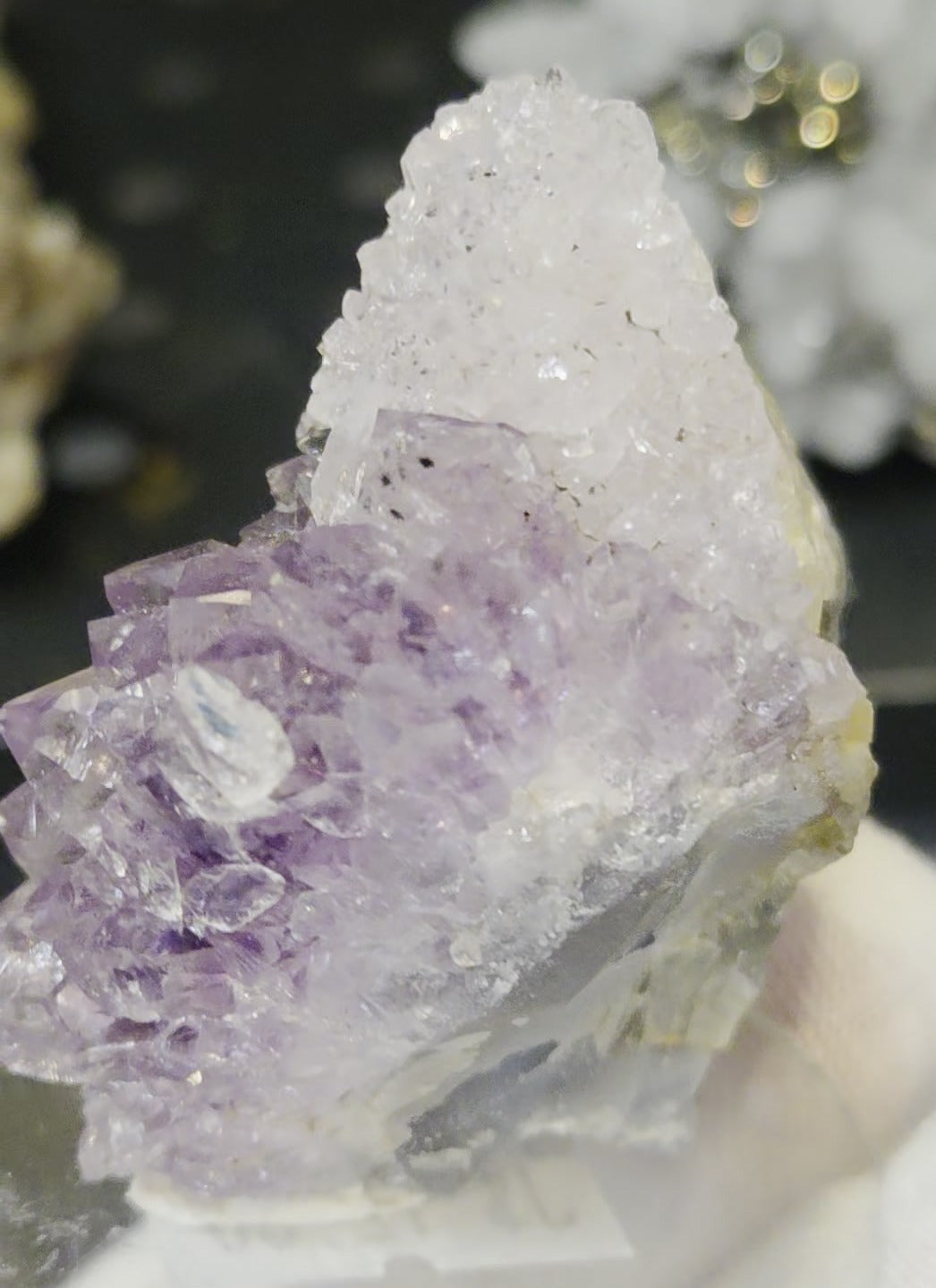 Sugar druzy calcite on amethyst cluster specimen