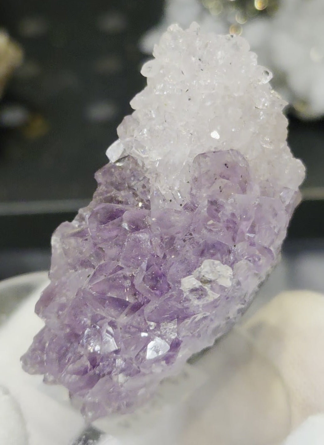 Sugar druzy calcite on amethyst cluster specimen