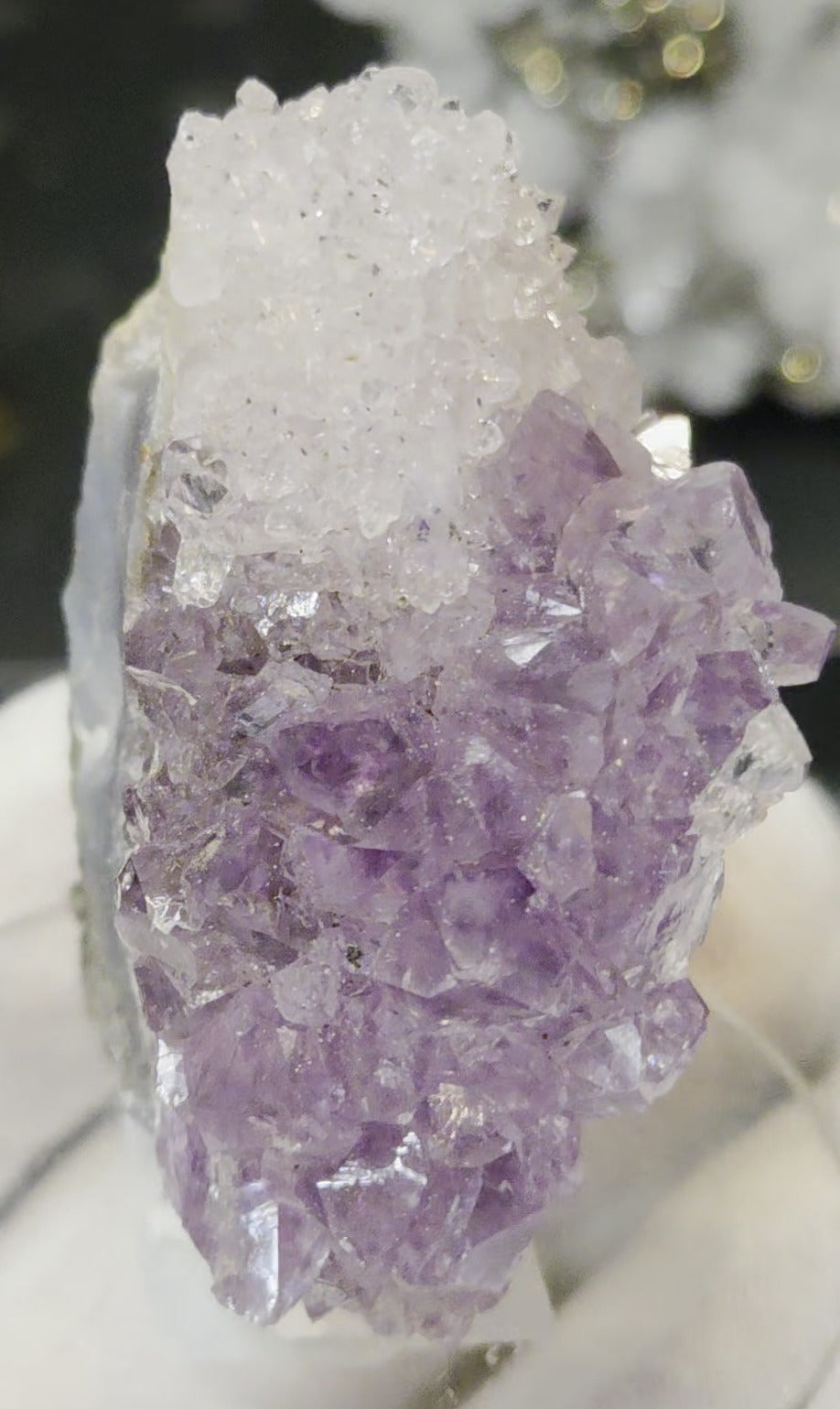 Sugar druzy calcite on amethyst cluster specimen