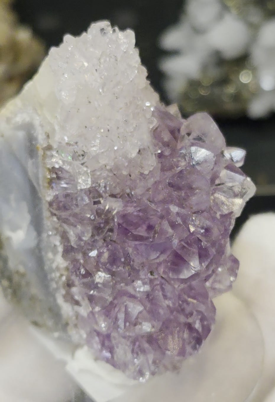 Sugar druzy calcite on amethyst cluster specimen