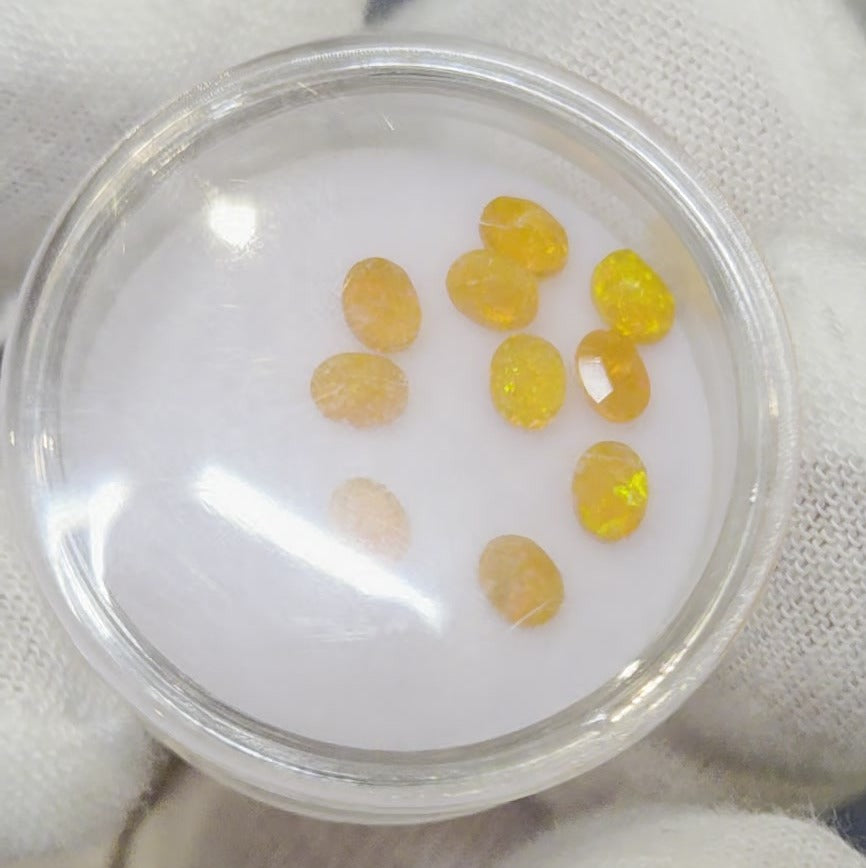 Natural faceted Welo opal gemstones